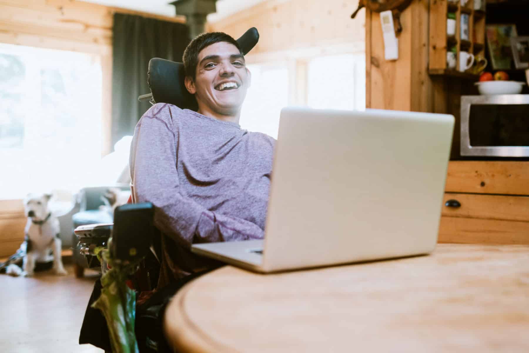 a disabled man checking on the status of his disability benefits