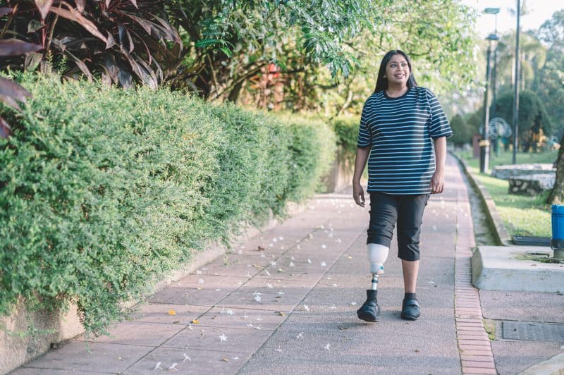 A woman with a prosthetic leg out for a walk in Los Angeles.